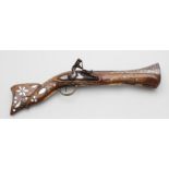 A 19th century Near Eastern flintlock blunderbuss pistol