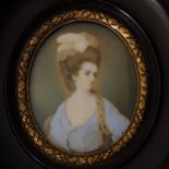 Y A framed portrait miniature on ivory