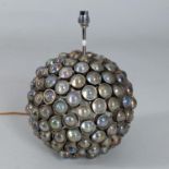 Table lighting to include a spherical steel and glass mounted table lamp