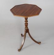 A parcel gilt and simulated rosewood octagonal tripod occasional table