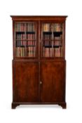 A George I walnut cabinet bookcase, circa 1720