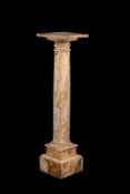 An Italian striated white and amber coloured marble columnar pedestal