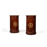 A pair of mahogany and gilt metal mounted cylindrical nightstands