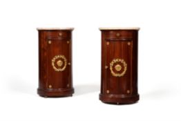A pair of mahogany and gilt metal mounted cylindrical nightstands