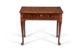 A George II figured walnut and feather banded side table, circa 1740