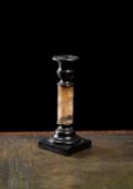 A Victorian Derbyshire fluorspar and slate candlestick