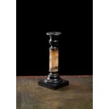 A Victorian Derbyshire fluorspar and slate candlestick