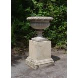 A Victorian artificial stone tazza urn attributed to Austin and Seeley