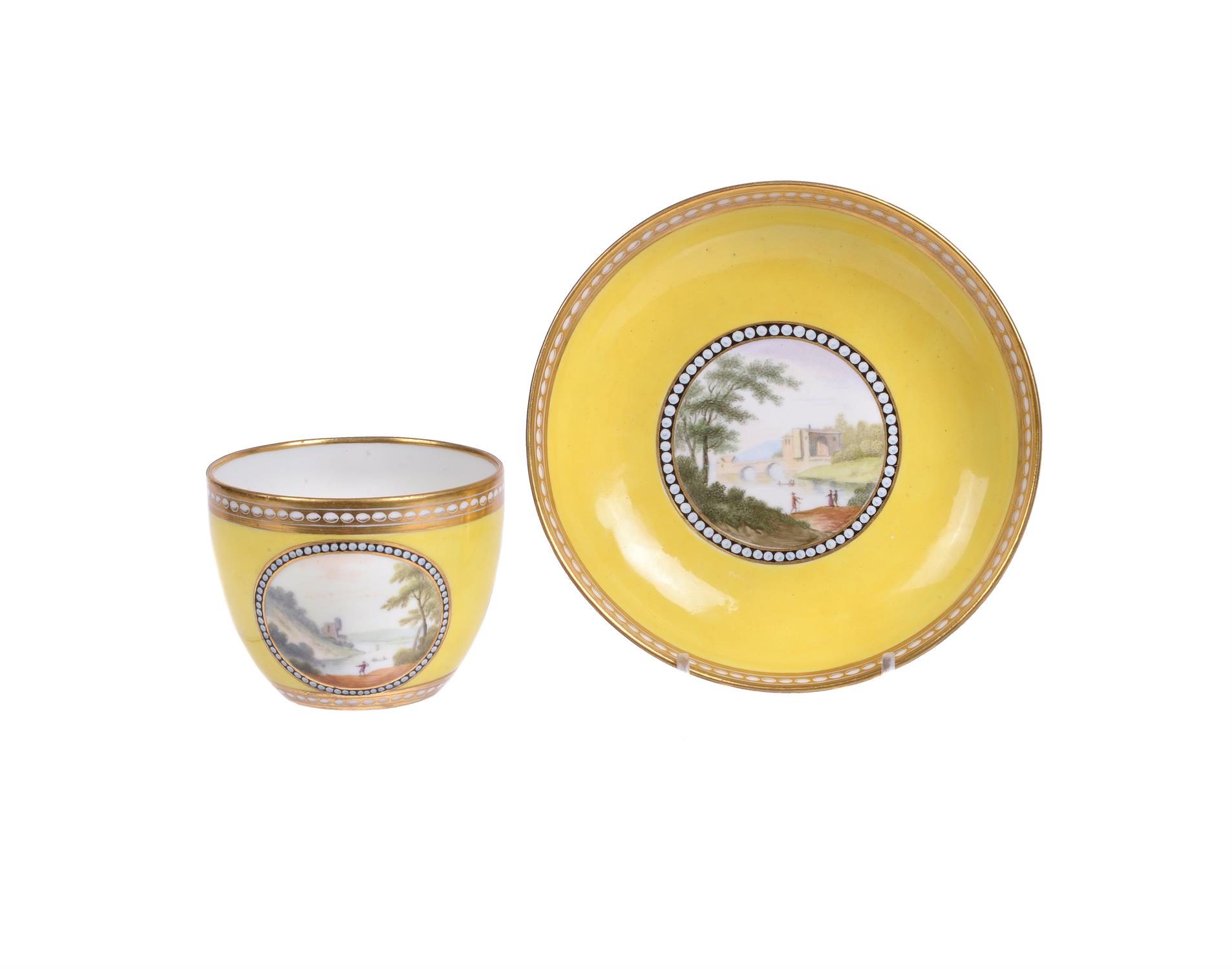 A Derby yellow ground 'Bute' shaped cup and a saucer