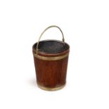 A George III mahogany and brass bound peat bucket, circa 1780