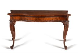 A George III mahogany serpentine serving table, circa 1760