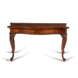 A George III mahogany serpentine serving table, circa 1760