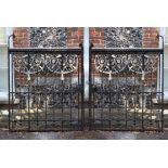 A pair of Arts and Crafts painted wrought and cast iron gates