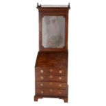 A pair of George III mahogany bureau bookcases, circa 1790