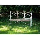 A Regency white painted cast iron garden bench