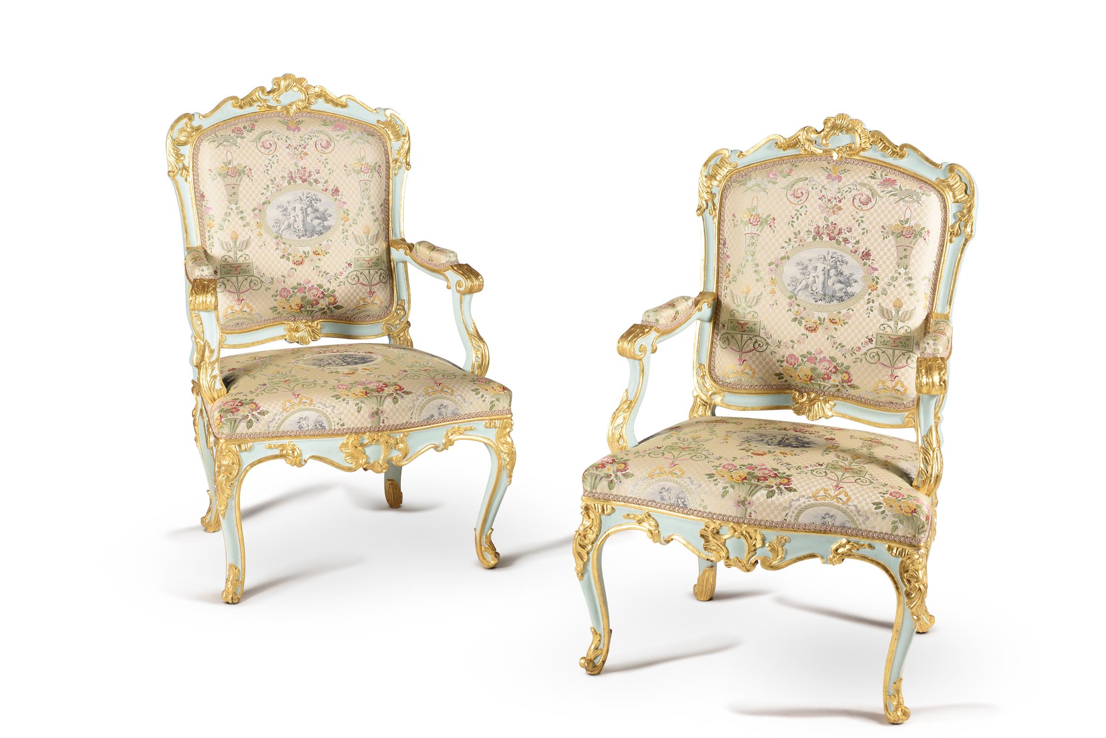 A pair of Italian carved wood, painted and parcel gilt armchairs, mid 18th century