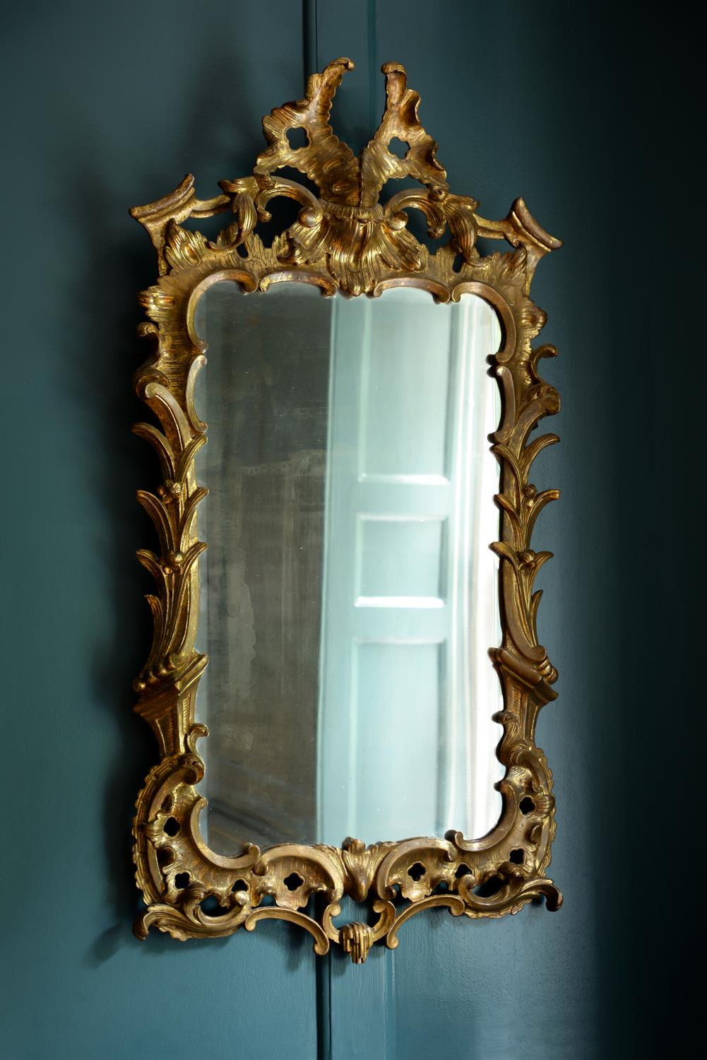 A George II giltwood wall mirror, circa 1750, probably Irish