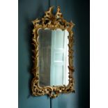 A George II giltwood wall mirror, circa 1750, probably Irish