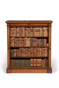 A Victorian oak and ebonised open bookcase by C. HINDLEY & SONS