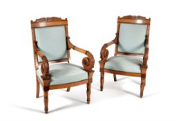 A pair of Charles X 'bird's eye' maple and upholstered armchairs