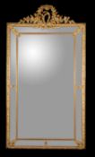 A large French giltwood wall mirror, in Louis XVI style, late 19th century