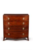 A George III mahogany and satinwood crossbanded bowfront chest of drawers