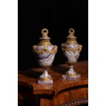 A pair of fine and rare French banded amethyst quartz and ormolu mounted pot pourri urns and covers