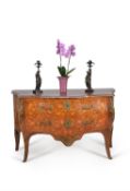 A Louis XV tulipwood and specimen marquetry serpentine commode, circa 1760