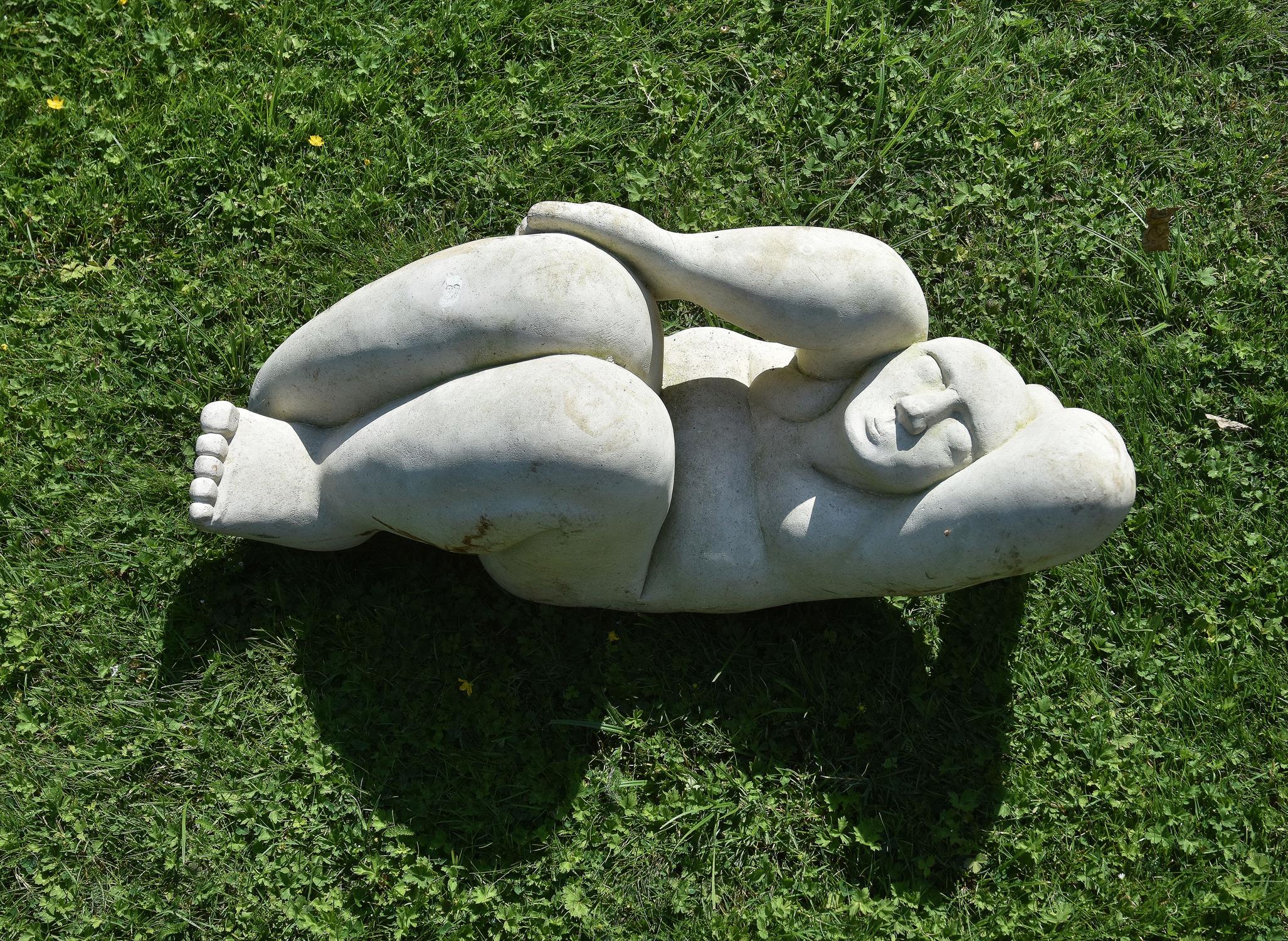 Attributed to Patrick Barker MRSS, a sculpted limestone model of a crouching man