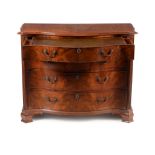 A George III mahogany serpentine dressing chest, circa 1770, in the manner of Gillows