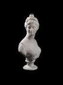 Manner of Jean-Antoine Houdon, a sculpted white marble bust of Diana the huntress