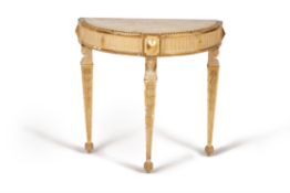 A cream painted and parcel gilt semi elliptical console table, late 18th century