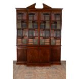 A George III mahogany breakfront secretaire library bookcase, circa 1780