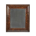 A William & Mary laburnum oyster veneered cushion framed wall mirror, circa 1690