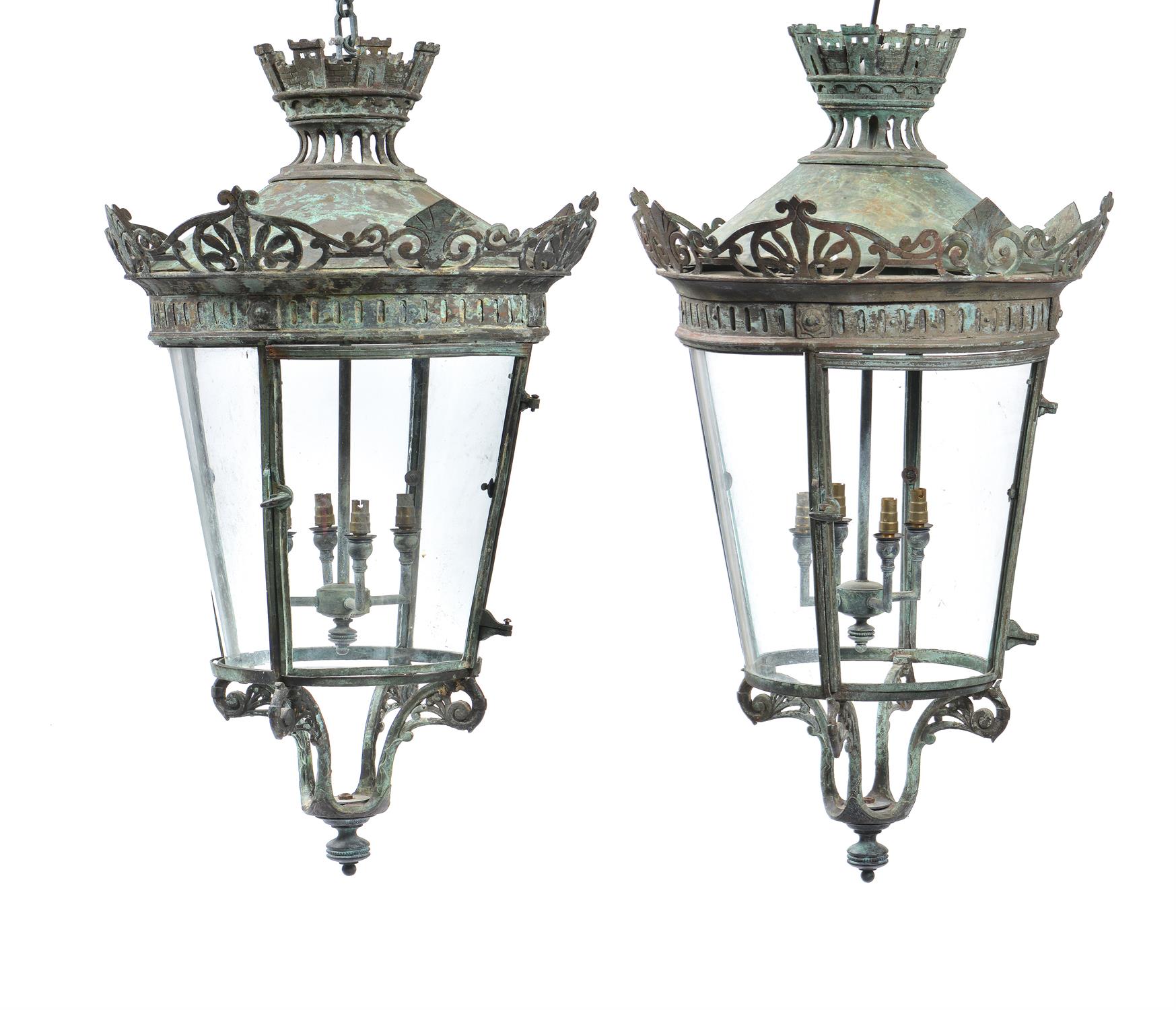 A pair of French verdigris patinated copper and glazed hanging lanterns