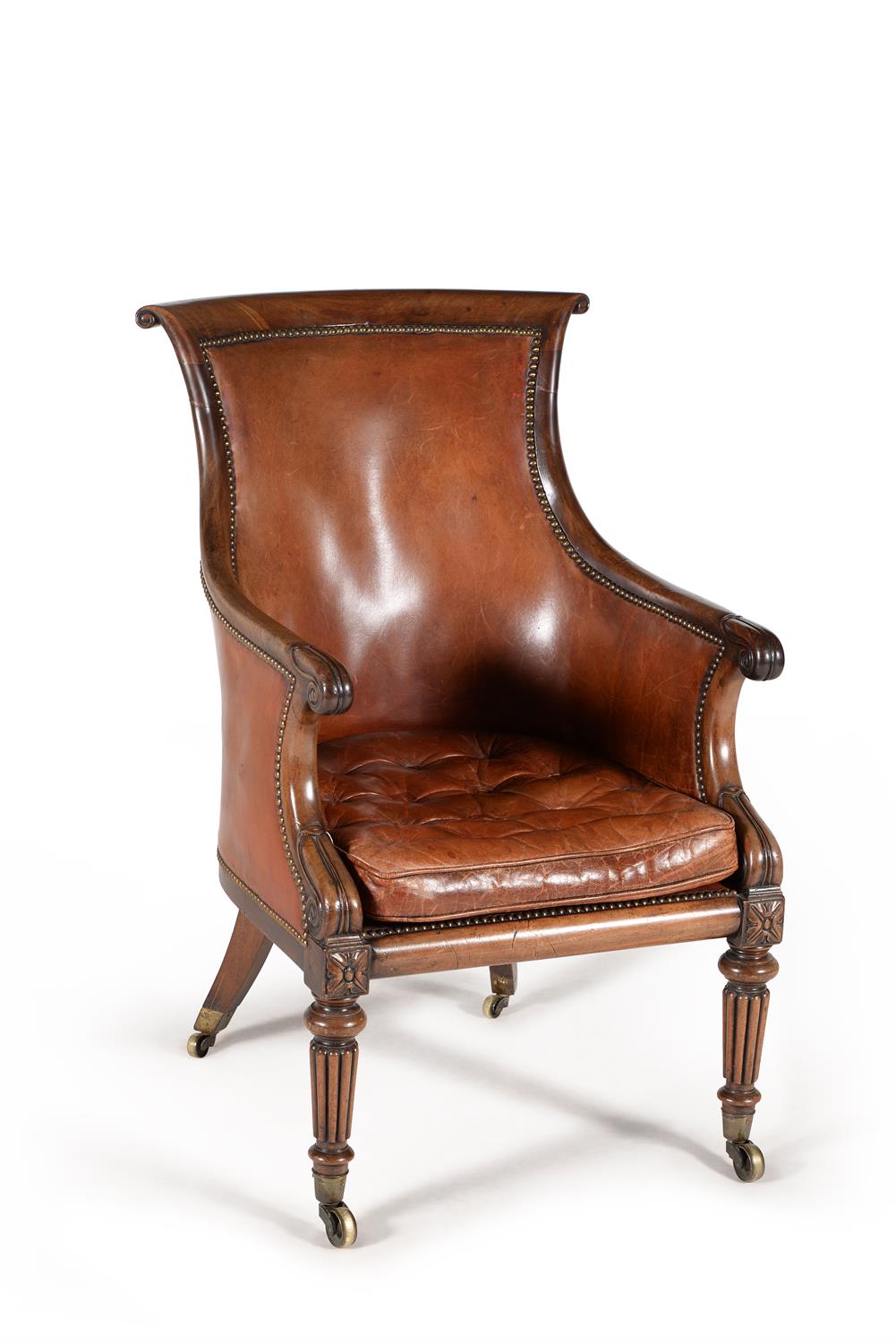 A George IV mahogany and leather upholstered library armchair, circa 1825