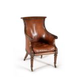 A George IV mahogany and leather upholstered library armchair, circa 1825