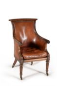 A George IV mahogany and leather upholstered library armchair, circa 1825