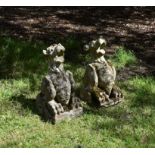 A pair of Victorian Gothic Revival carved stone models of gargoyles