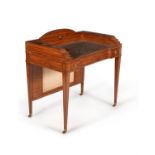 A Victorian satinwood writing table
