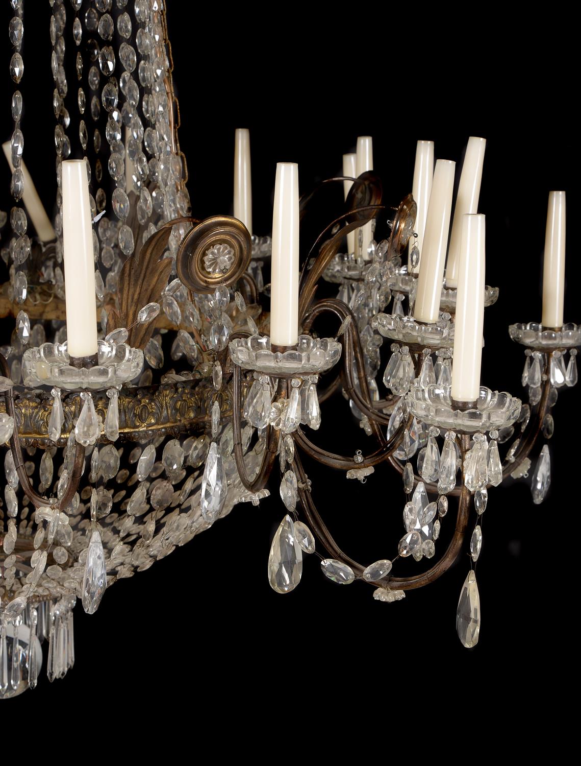 A pair of Continental clear glass and gilt metal mounted twenty-four light chandeliers in early 19th - Image 2 of 2