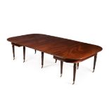 A George III mahogany extending dining table by Thomas Butler, circa 1805-1810