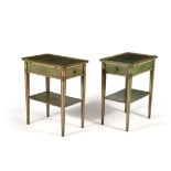 A pair of green and polychrome painted two tier side tables