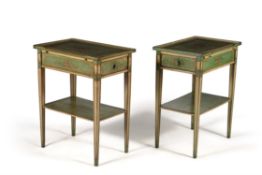 A pair of green and polychrome painted two tier side tables