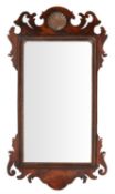 A George II mahogany and parcel gilt wall mirror, circa 1750
