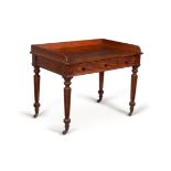 A George IV mahogany dressing table, circa 1825, in the manner of Gillows