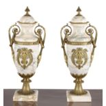 A pair of Continental marmo cipollino and ormolu mounted twin handled urns