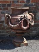 A painted cast iron garden urn by A. Motteau of Buenos Aires