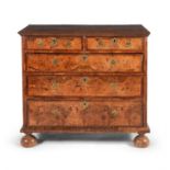 A William & Mary walnut, figured walnut and feather banded chest of drawers, circa 1690
