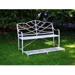 A Regency white painted cast and wrought iron 'games seat'